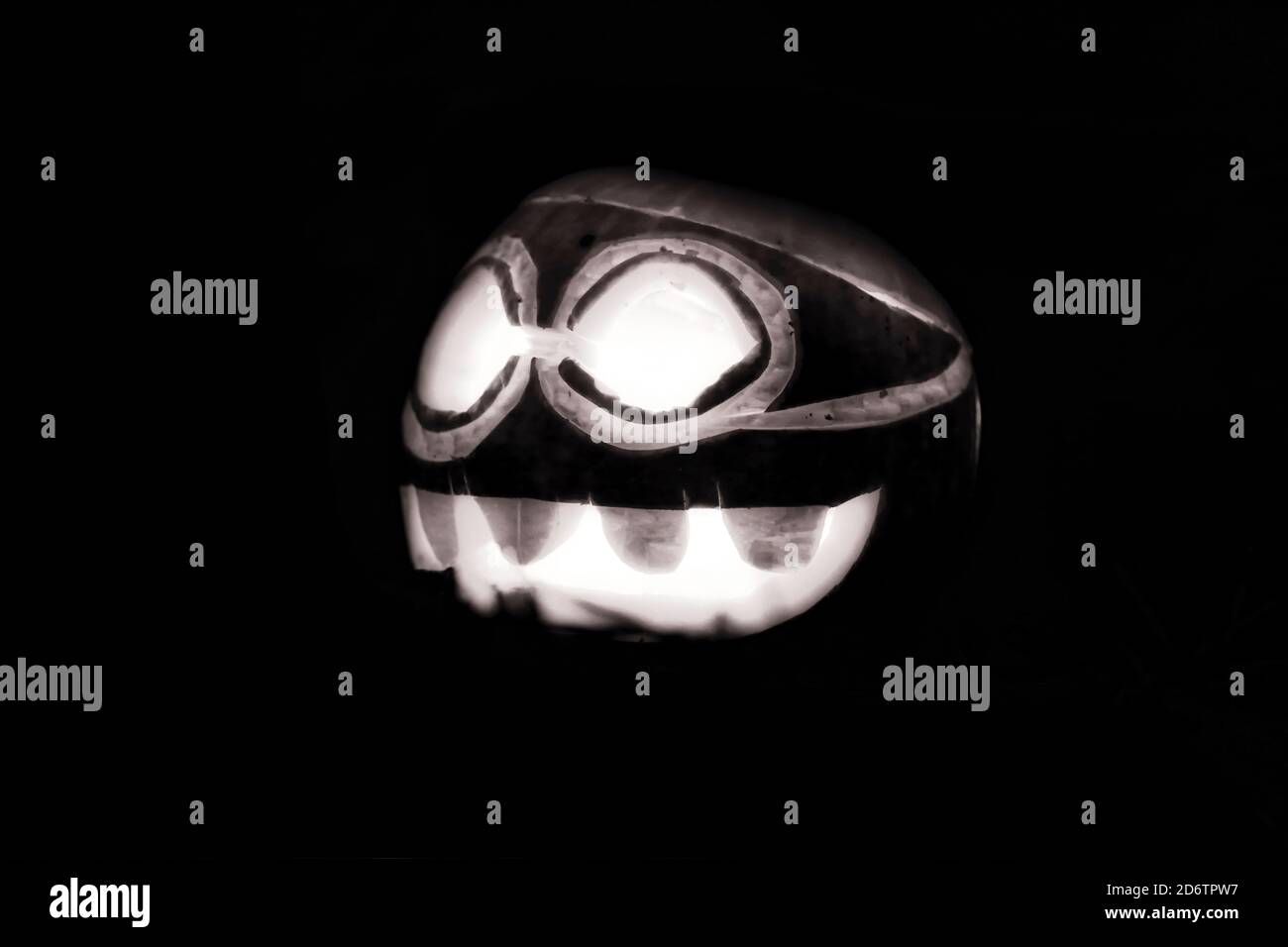 Glowing Halloween Pumpkin in the dark night in black and white Stock ...