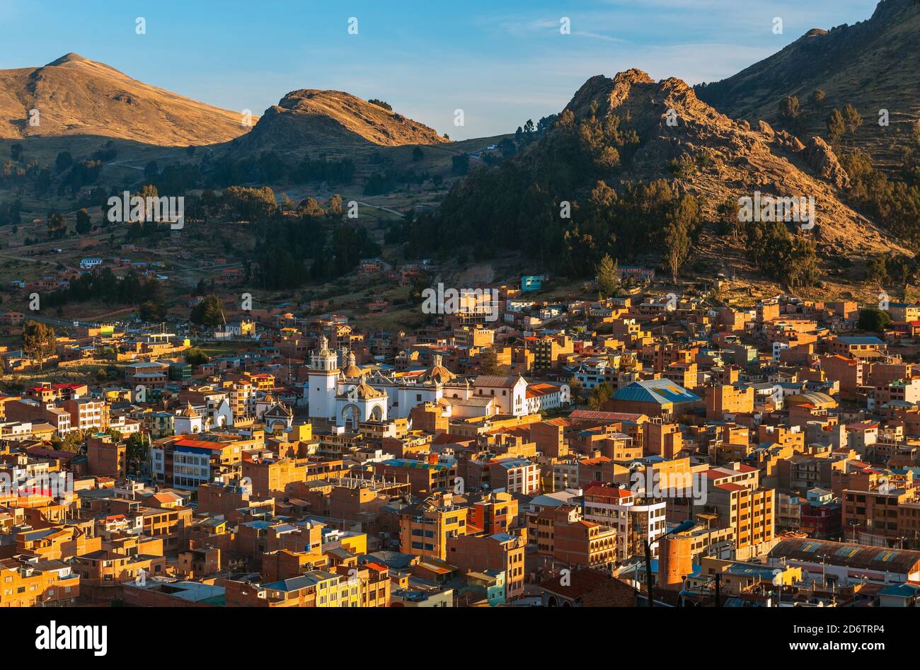 Aerial cityscape of Copacabana at sunset with the Our Lady of Copacabana Basilica, Bolivia. Stock Photo