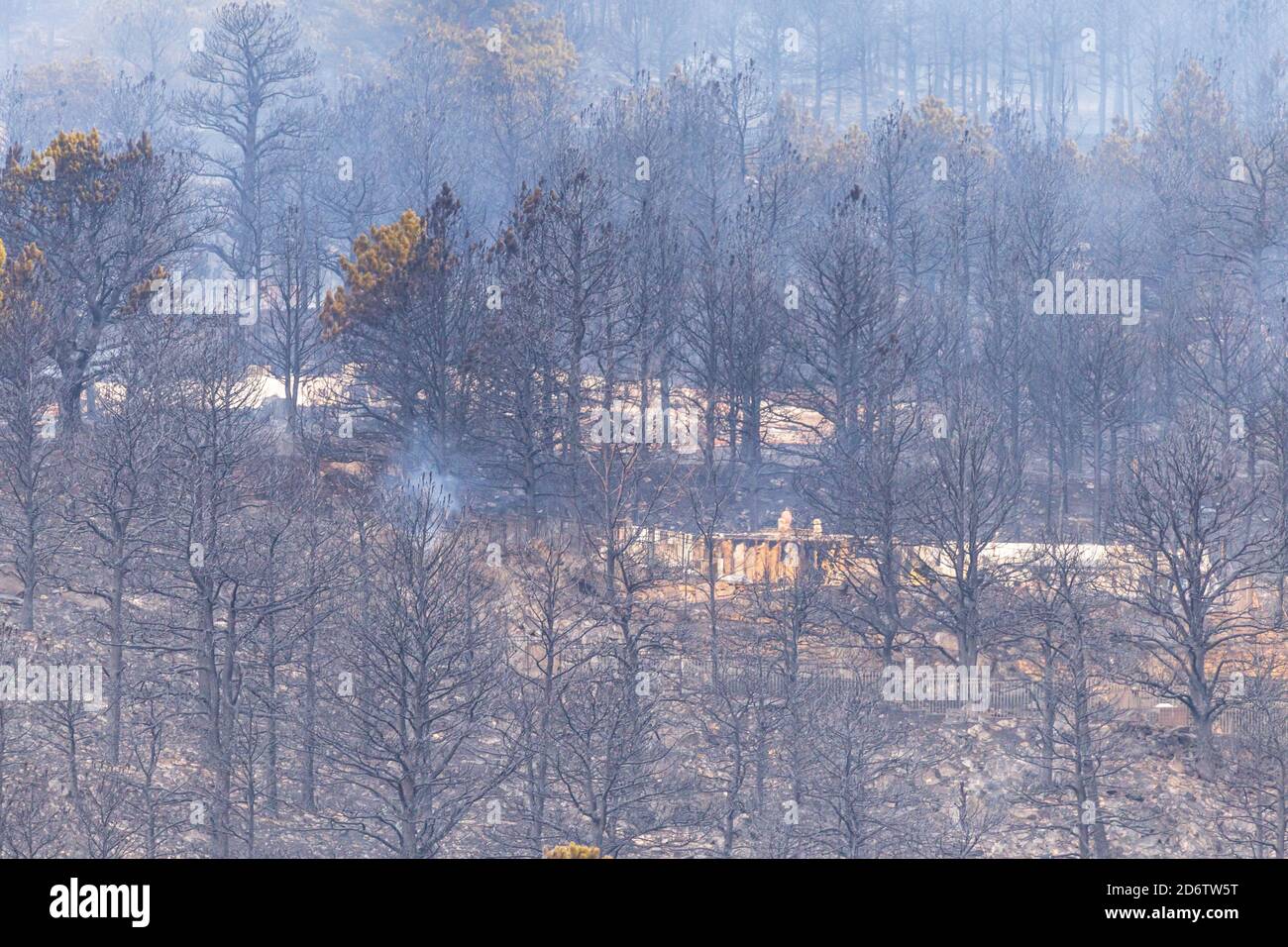 Houses burned to the ground and destroyed after a wildfire burned