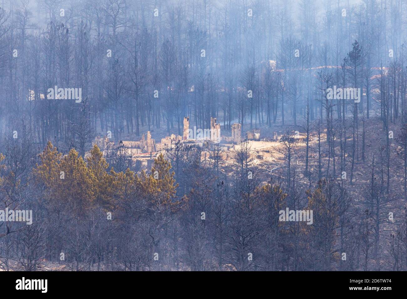 Houses burned to the ground and destroyed after a wildfire burned through the night before in Colorado Stock Photo