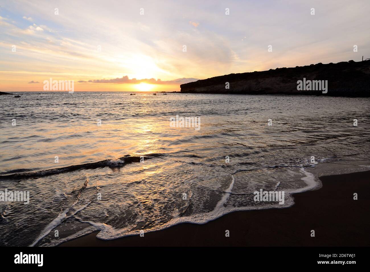 Sea Setting Example The Sun Setting in the Sea Stock Photo - Alamy