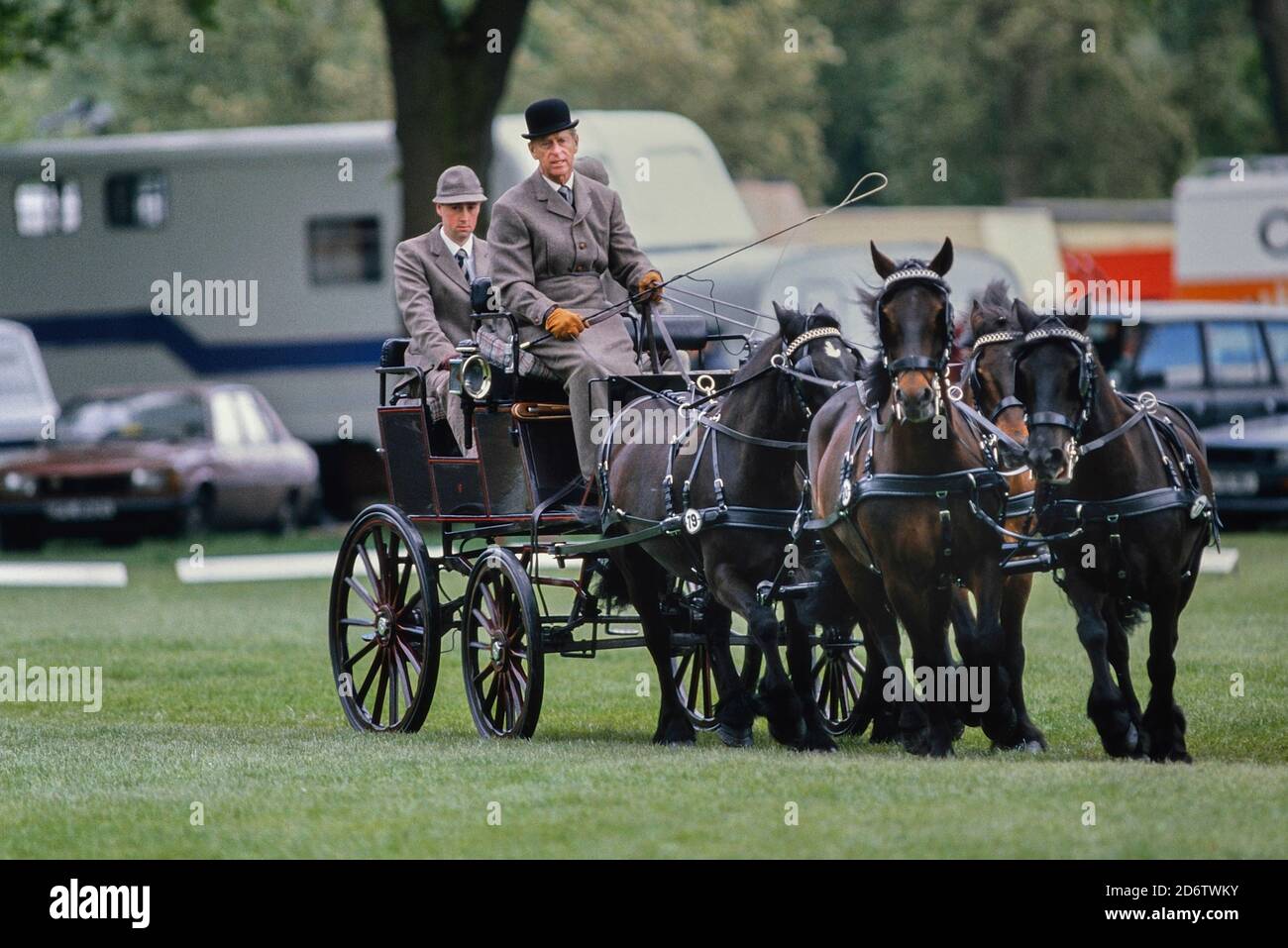 Prince Philip, Duke of Edinburgh competing in the dressage stage of the carriage riding championship. Royal Windsor Horse show. Berkshire, England, UK  Circa 1989 Stock Photo