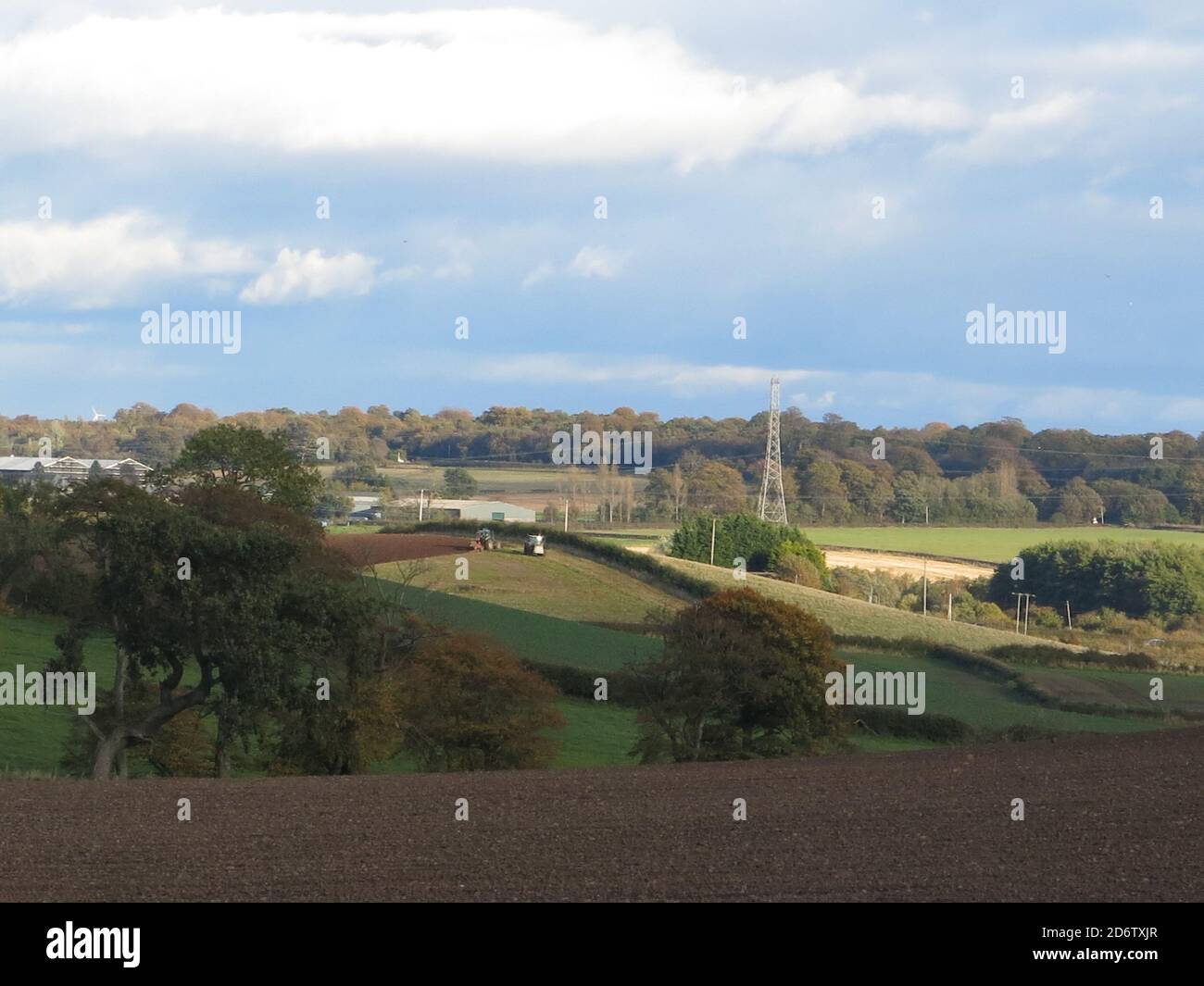 Just a few miles north of Glasgow, there is gentle rolling countryside, ploughed fields and the Campsies in the distance; October 2020 Stock Photo
