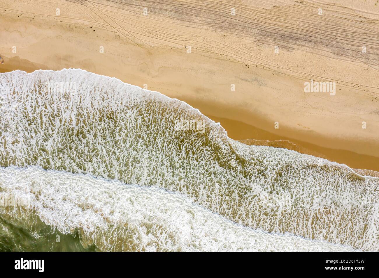 Aerial detail of the waves rolling in on an Amagansett beach, Amagansett, NY Stock Photo