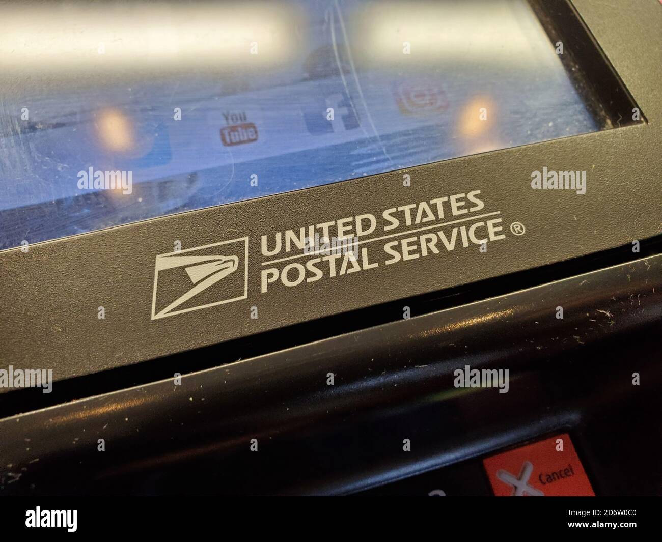 Close-up of logo for United States Postal Service on edge of computer screen on payment acceptance kiosk, San Ramon, California, August 28, 2020. () Stock Photo