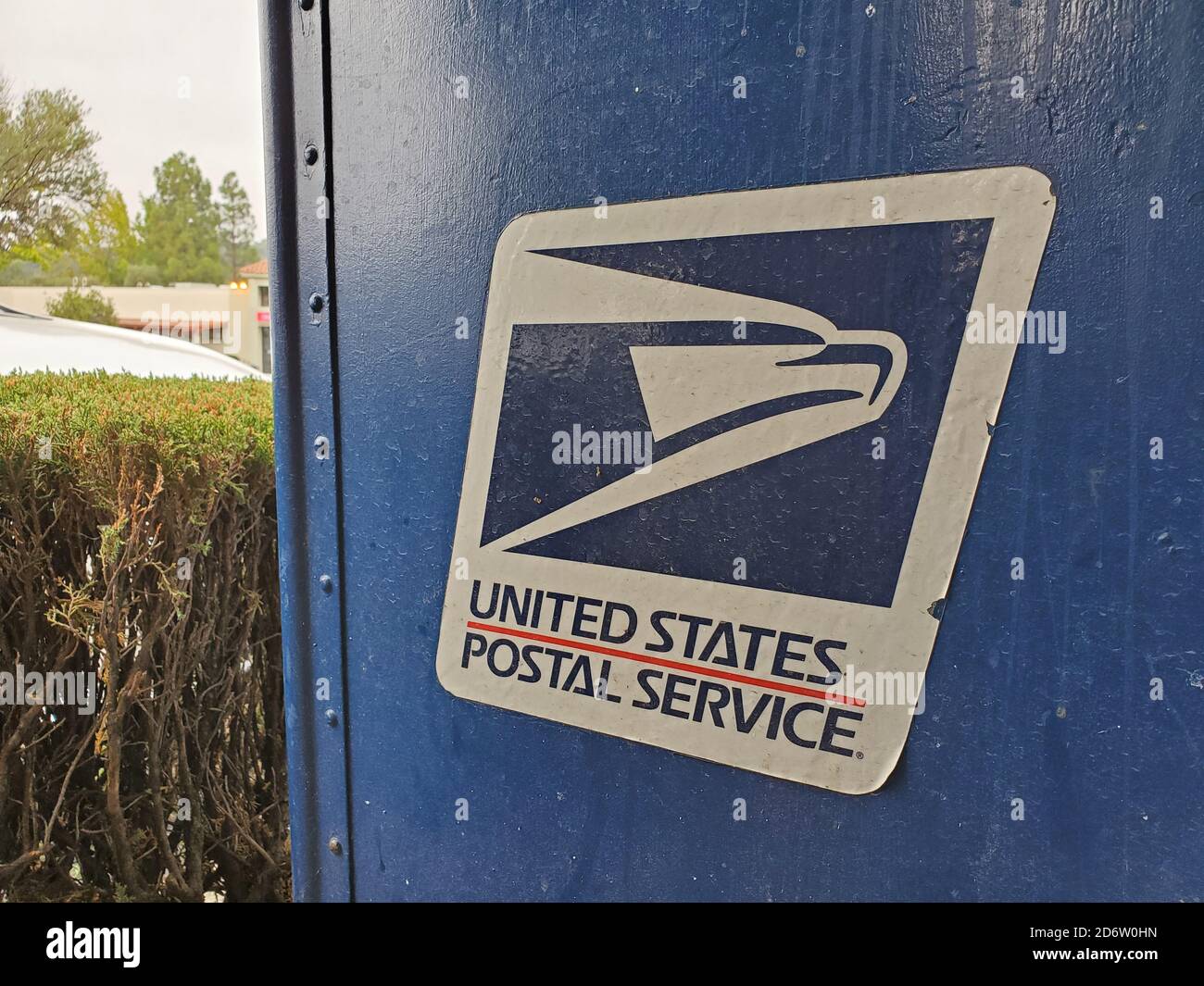 Closeup of logo for United States Postal Service (USPS) on mailbox in
