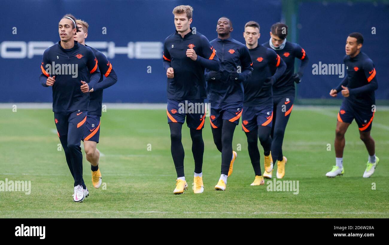Leipzig, Germany. 19th Oct, 2020. Football: Champions League, group stage, RB Leipzig - Istanbul Basaksehir. Leipzig's players run across the pitch during the final training. Credit: Jan Woitas/dpa-Zentralbild/dpa/Alamy Live News Stock Photo
