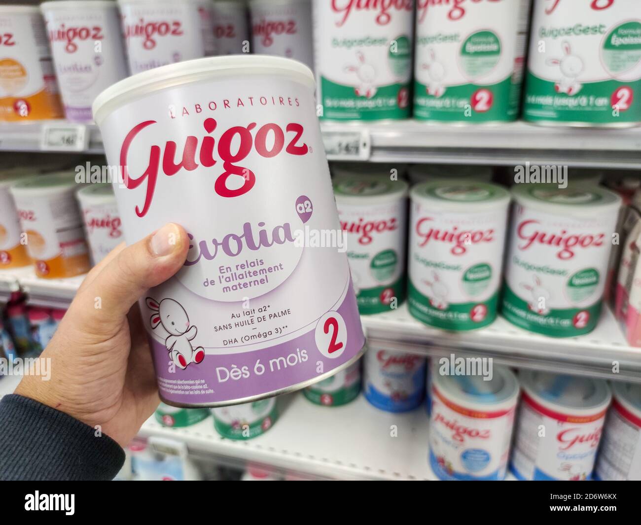 Puilboreau, France - October 14, 2020:A consumer chooses a box of Guigoz  brand baby milk from the baby food section of a supermarket Stock Photo -  Alamy