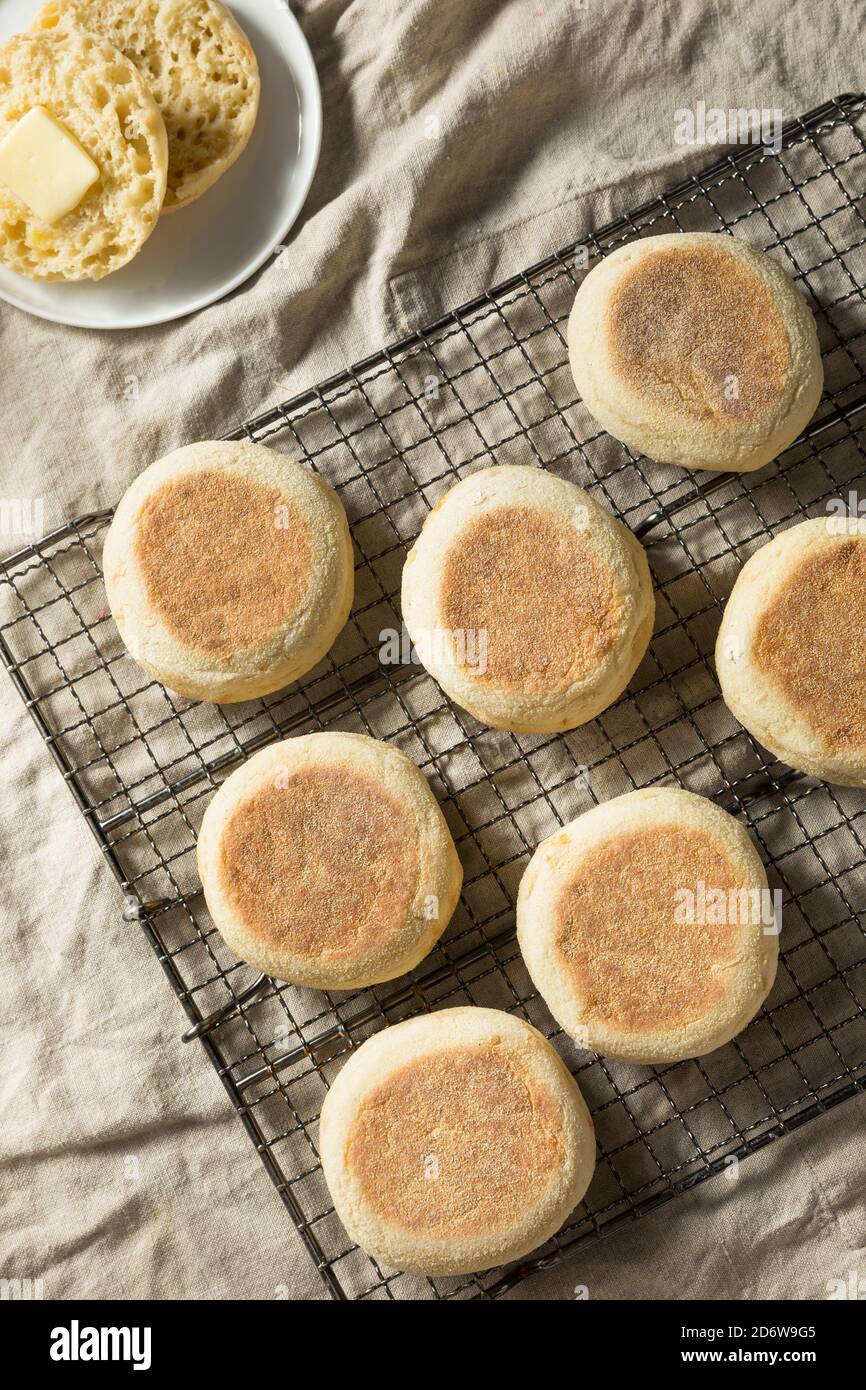 Homemade Toasted English Muffins with a Tab of Butter Stock Photo Alamy