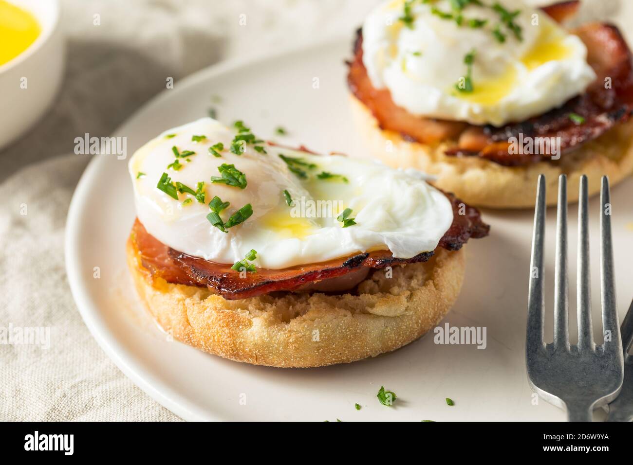 Warm Homemade Eggs Benedict with Ham and Hollandaise Stock Photo Alamy