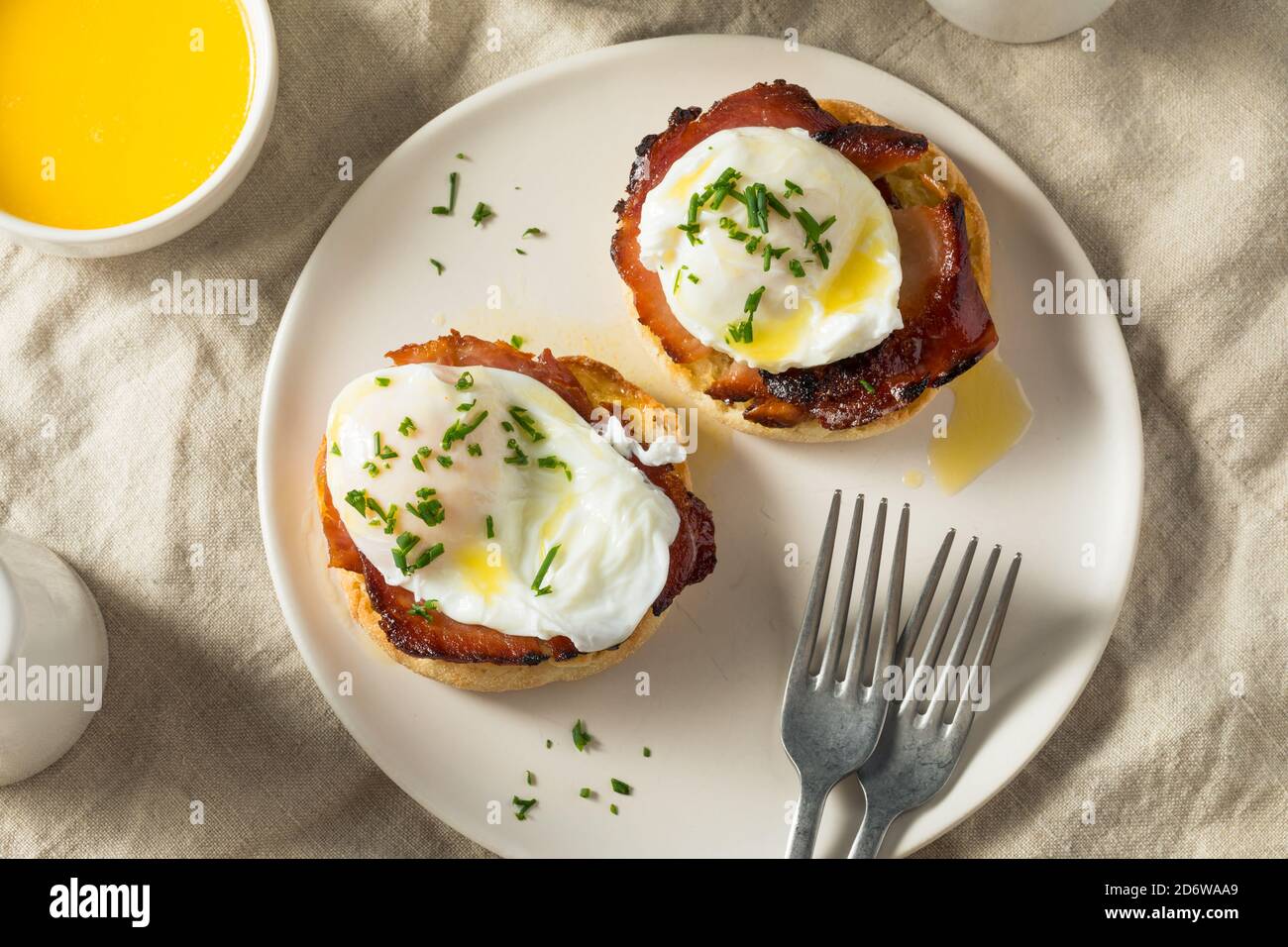 Warm Homemade Eggs Benedict with Ham and Hollandaise Stock Photo Alamy