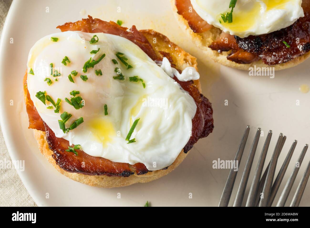 Warm Homemade Eggs Benedict with Ham and Hollandaise Stock Photo Alamy