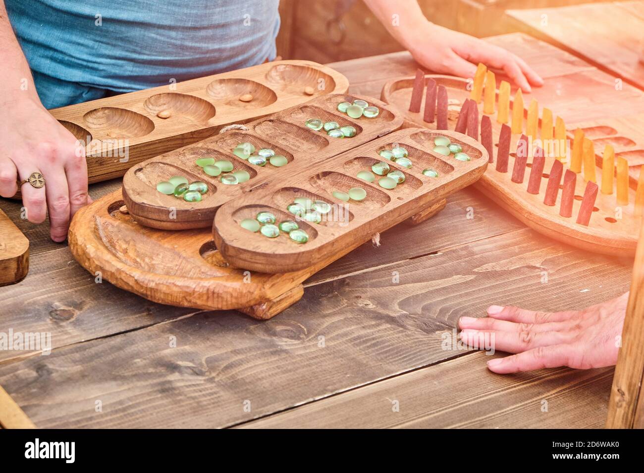 Ovare is a board logic game for two from vintage mancala games. Two players play the retro boardgame Kalah. Stock Photo