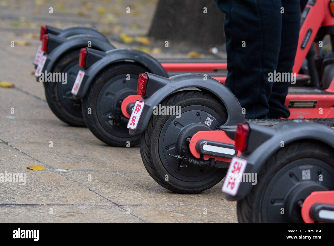 Voi electric e-scooters with number / identification plates in Birmingham, UK to tackle antisocial behaviour on the devices Stock Photo