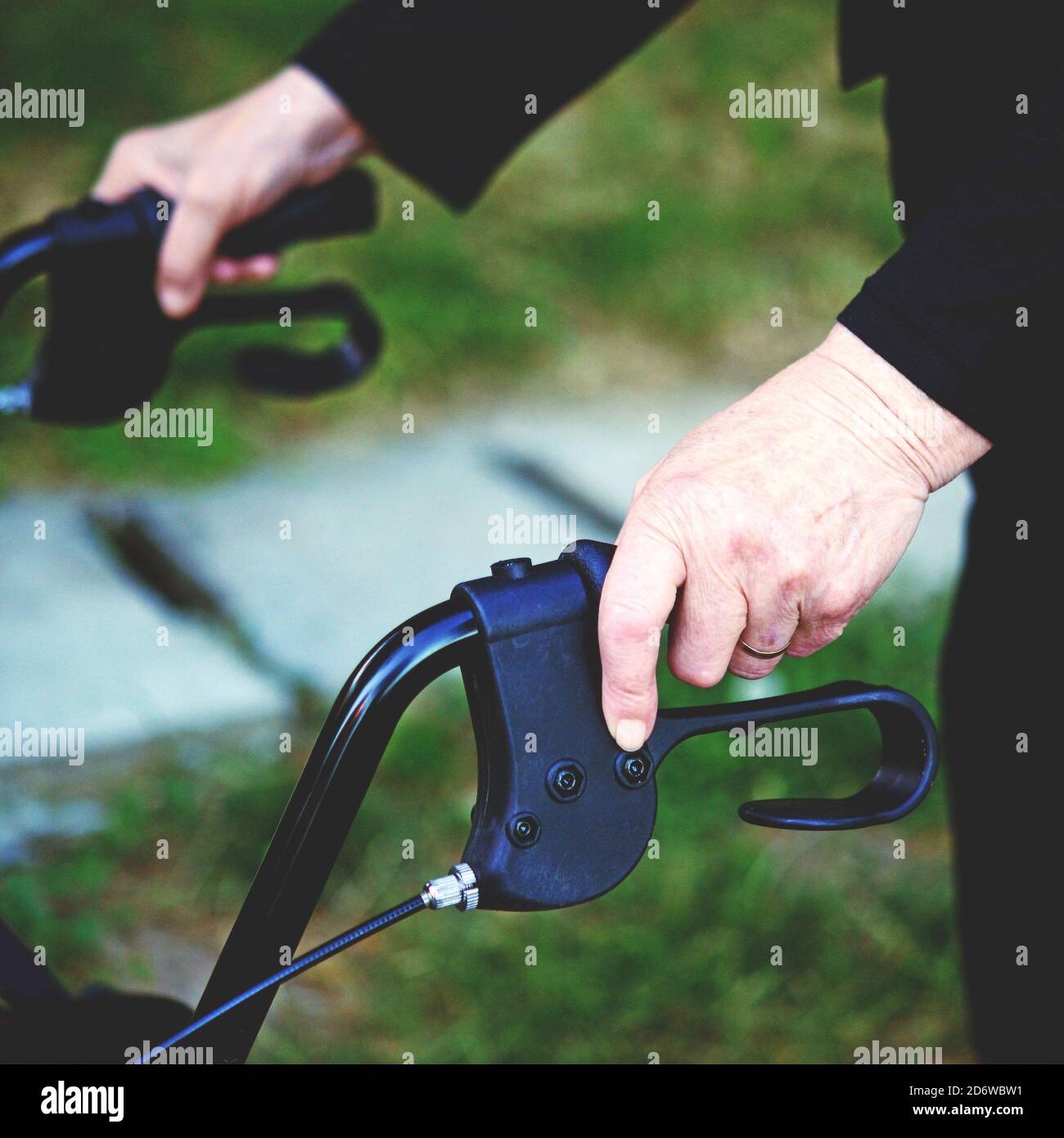 Closeup of a senior woman using walking frame Stock Photo Alamy