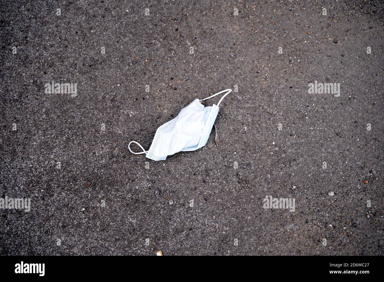 Discarded disposable PPE face mask Stock Photo