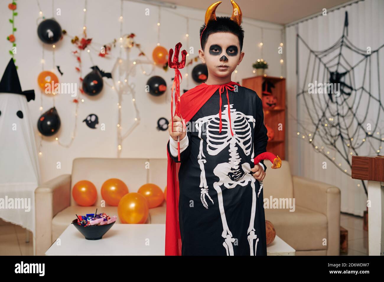 Preteen boy at Halloween party Stock Photo Alamy