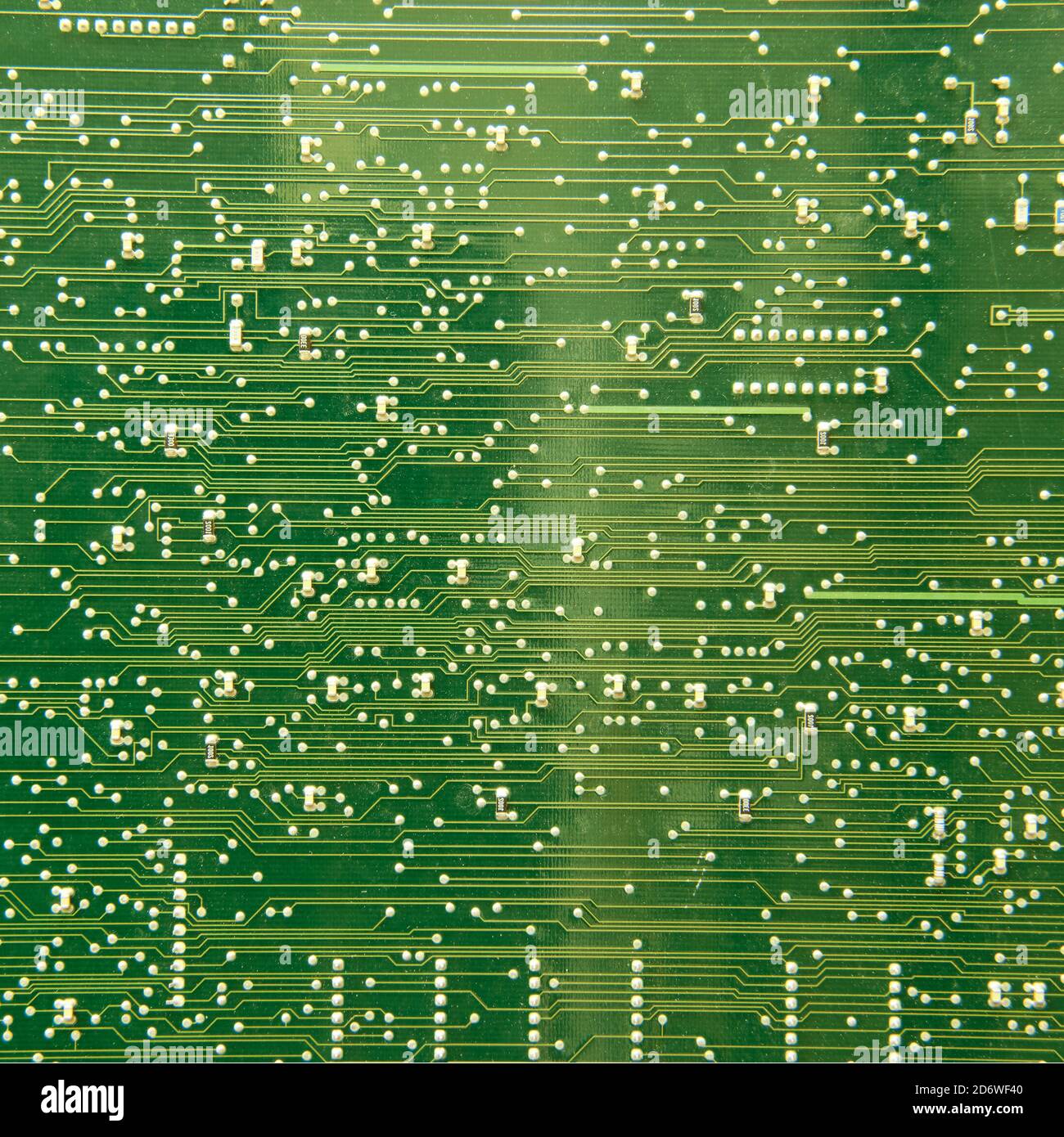 Texture of green printed wiring board (PWB). Designed for electrical and mechanical connection of various electronic components of the phone Stock Photo