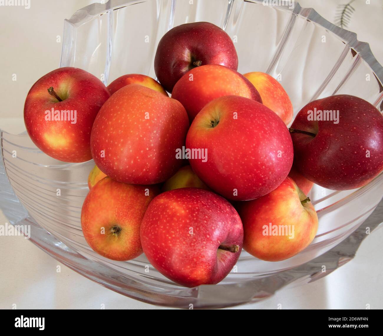 A Red Apples in a crystal vase Stock Photo