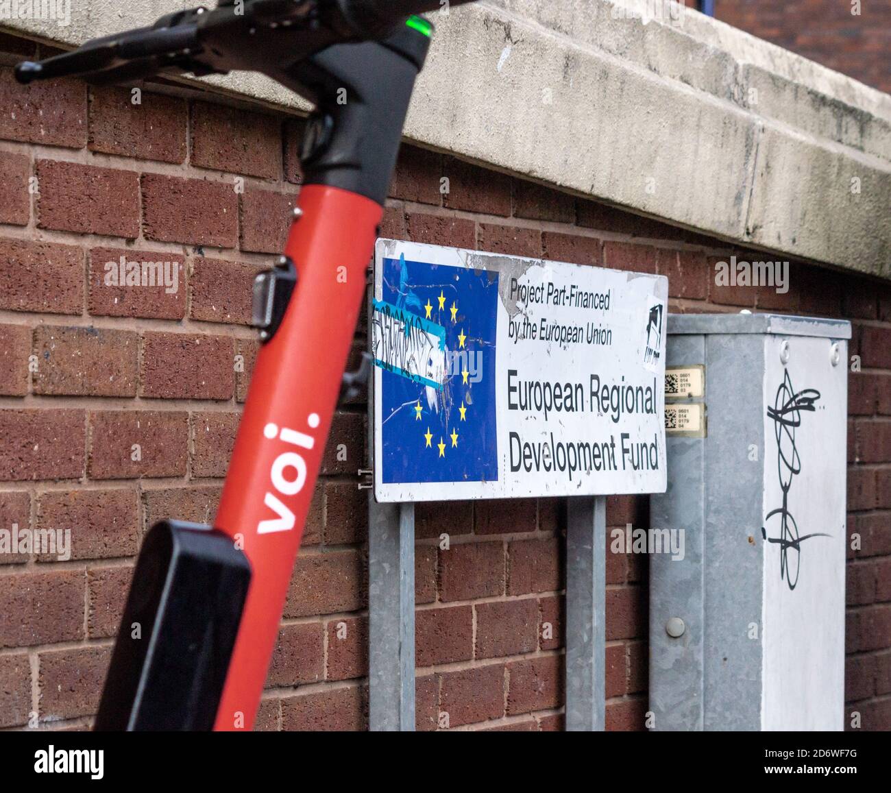 Voi electric scooter next to EU sign - European Regional Development Fund, Birmingham UK Stock Photo
