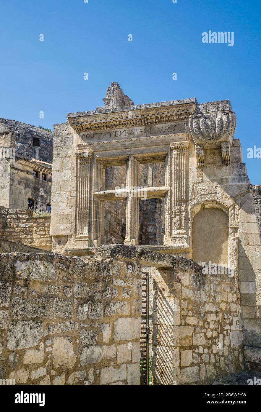 The “Post Tenebras Lux” window (meaning: Light after darkness), a  Renaissance relic at Les Baux-de-Provence, Bouches-du-Rhône department,  Provence Stock Photo - Alamy