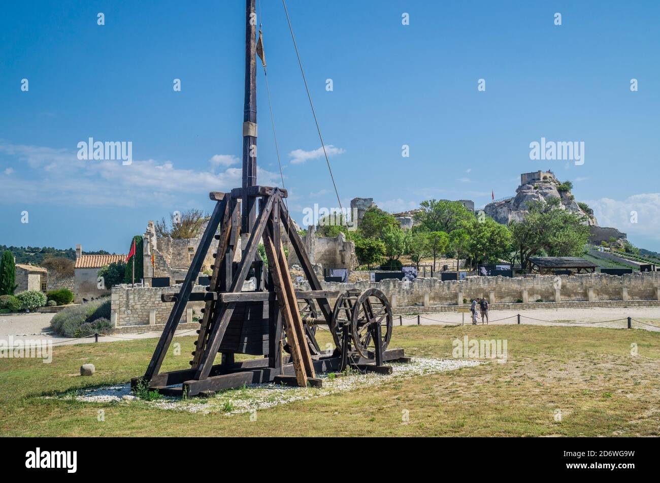 medieval trebuchet catapult siege engine displayed at the ruined castle of Château des Baux-de-Provence, Bouches-du-Rhône department, Southern France Stock Photo