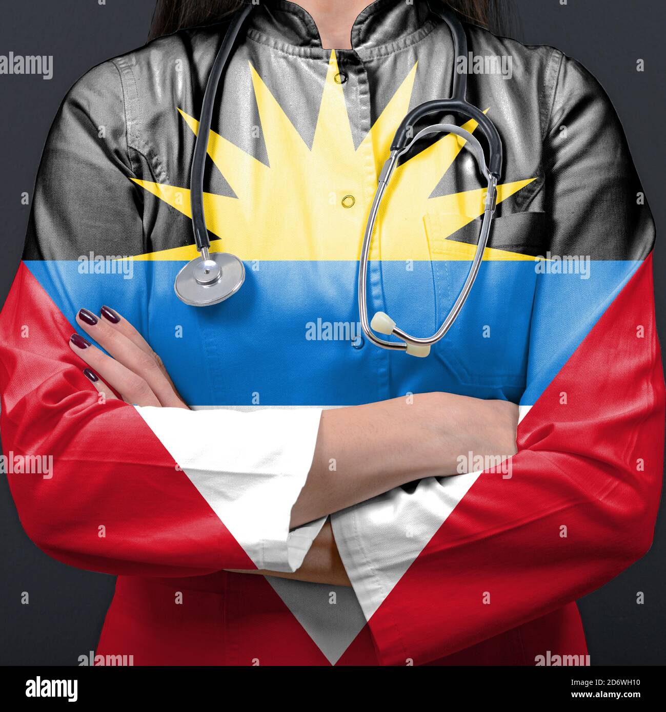 Doctor representing healthcare system with National flag of Antigua and
