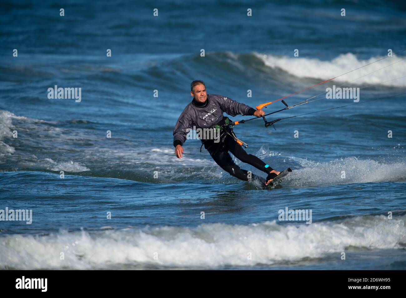 Kite surfing on Corporation Beach in Dennis, Massachusetts, USA (Cape Cod) on an autumn day. Stock Photo