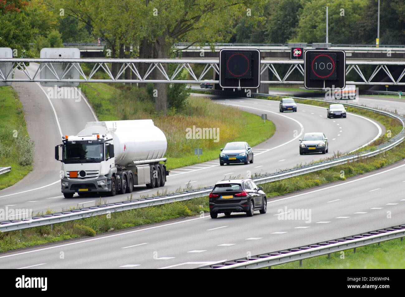 Highway with cars and electronic speed sign in Arnhem, Netherlands Stock  Photo - Alamy