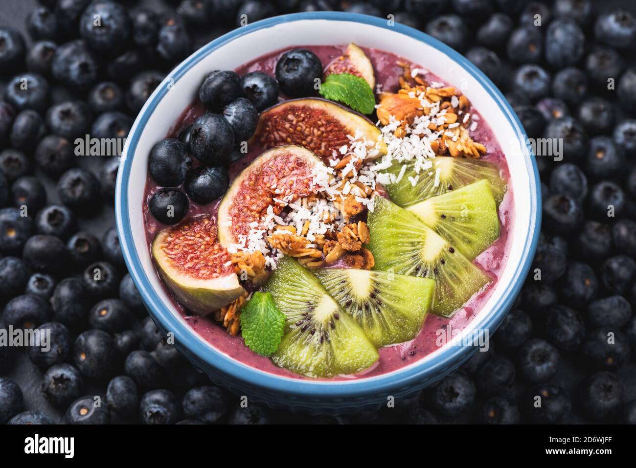 Acai Smoothie Bowl With Kiwi Figs And Granola. Healthy Superfood