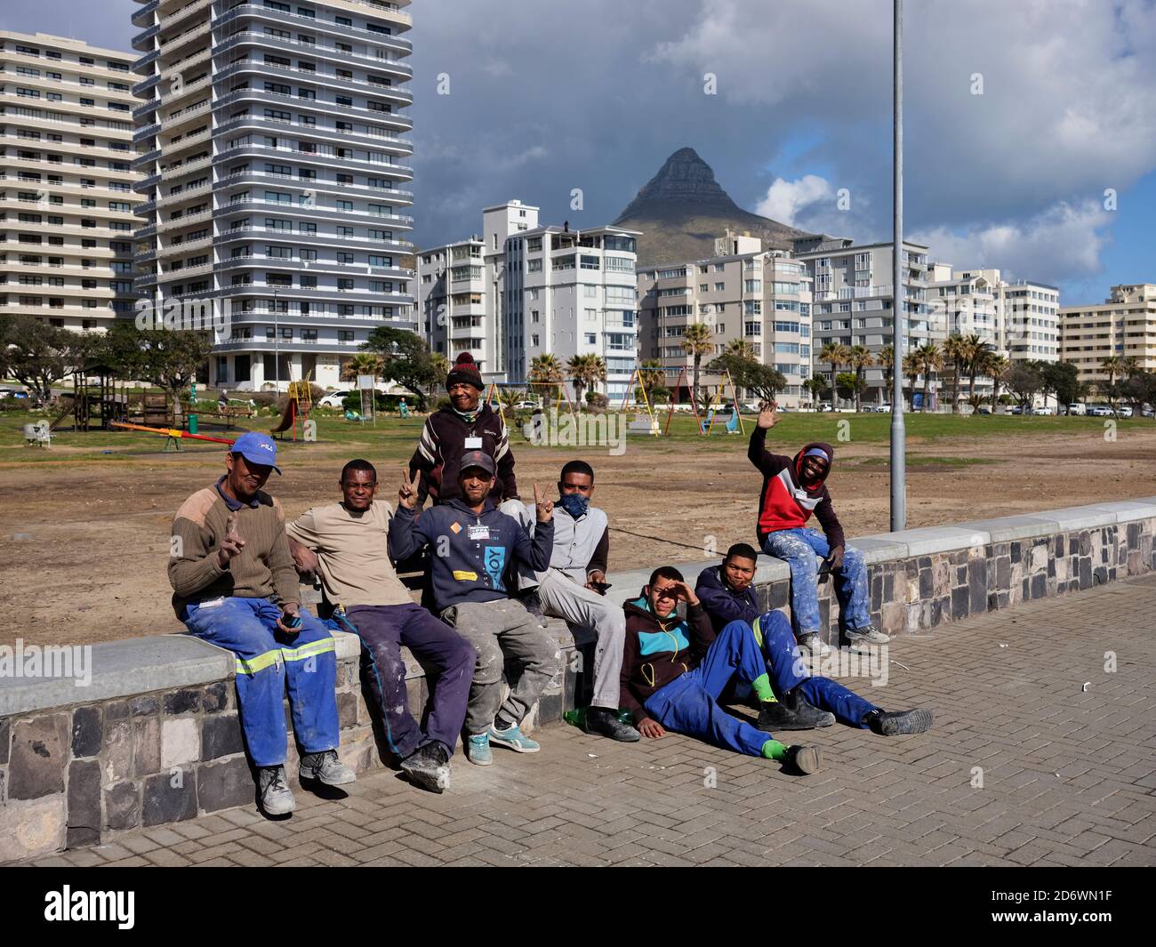 Couple of friendly local men chilling at the Sea Point Promenade in Cape Town, South Africa. Stock Photo