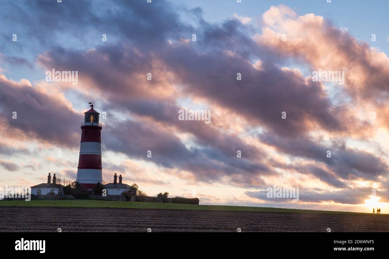 Happisburgh Lighthouse sunset Stock Photo