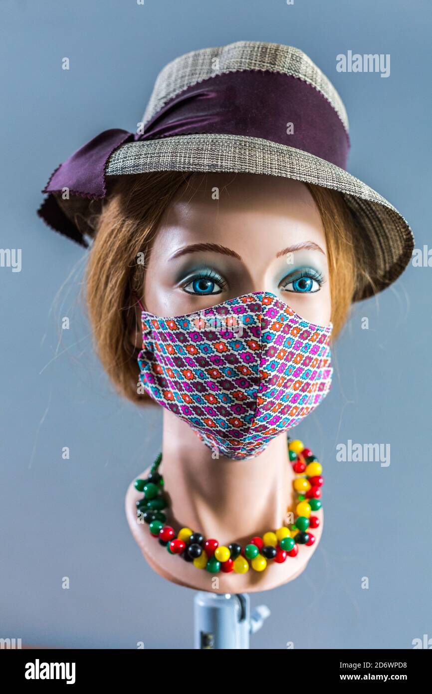 Woman wearing homemade mask. Stock Photo