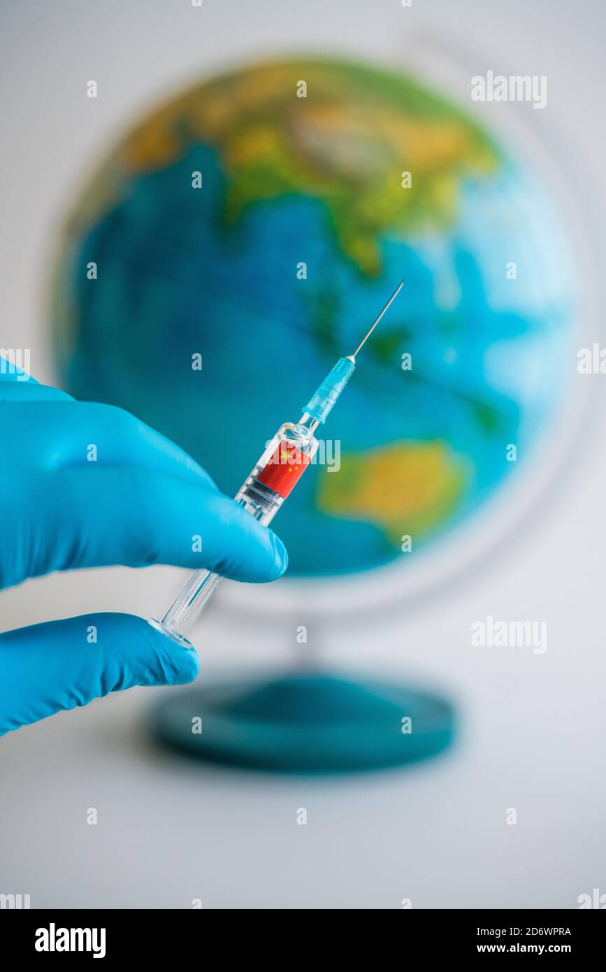 Conceptual image on the competition between China and others countries on the production and distribution of a vaccine against Covid 19. Stock Photo