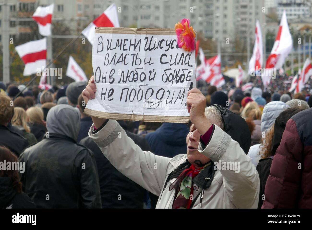 Minsk, Belarus - October 18, 2020. Old woman holding a poster. Peaceful demonstration against government violence and electoral fraud in Belarus. Stock Photo
