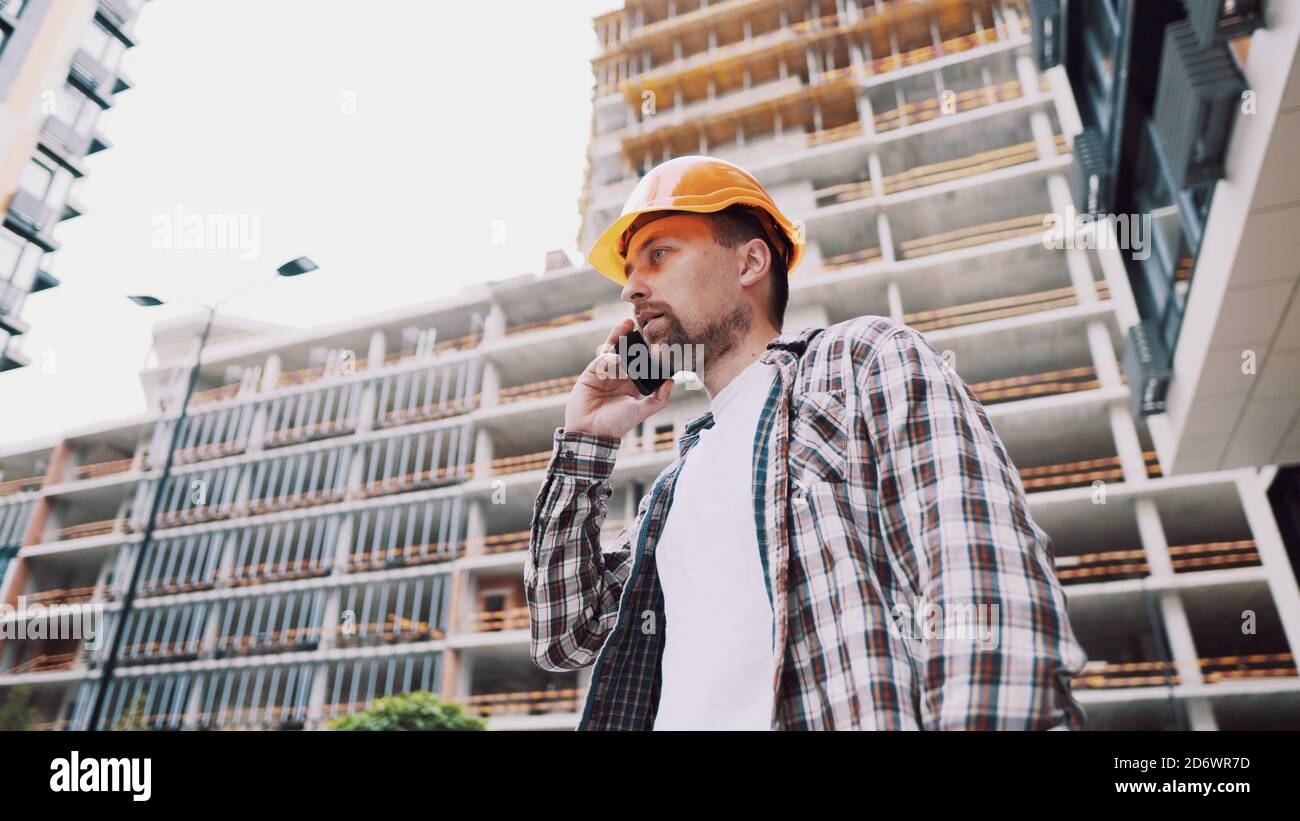 Civil engineer male hard hat phone hi-res stock photography and images ...
