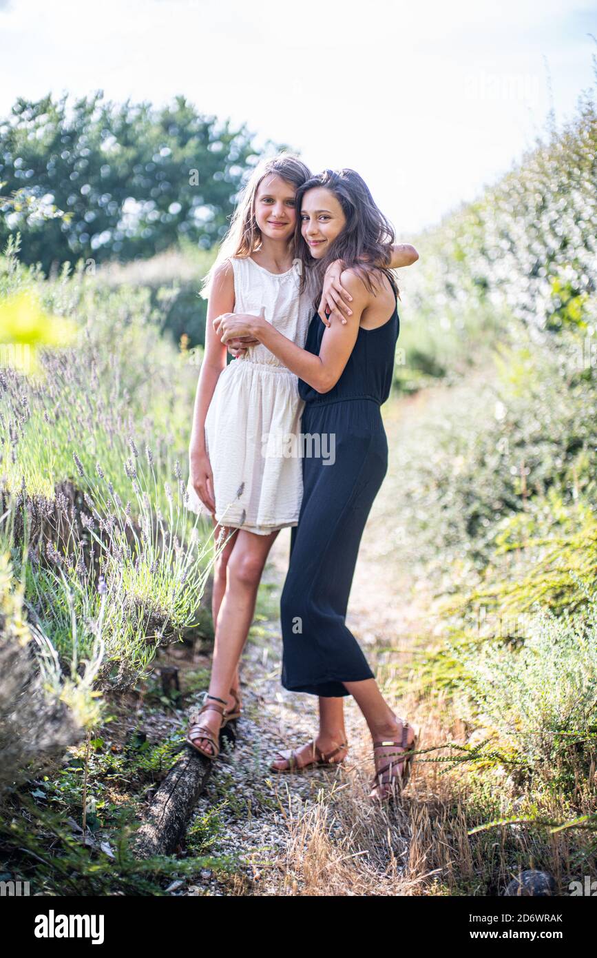 10 and 13 year old sisters. Stock Photo