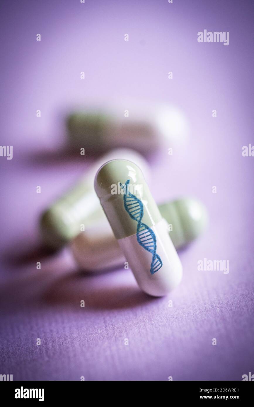Deoxyribonucleic acid (dna) capsules, computer artwork. Stock Photo