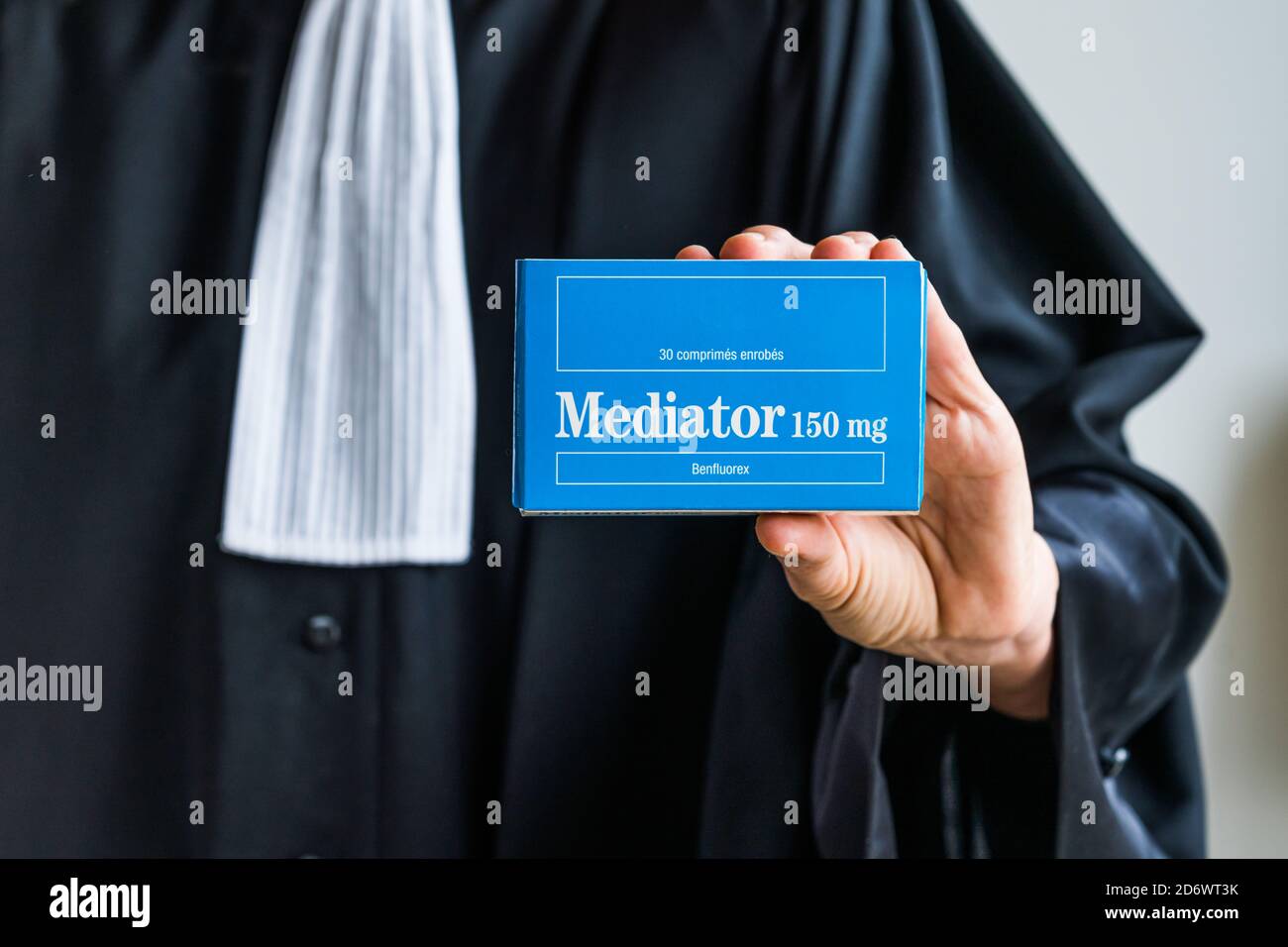 Lawyer holding a box of Mediator ® (chlorhydrate de benfluorex of Laboratoires Servier). Stock Photo
