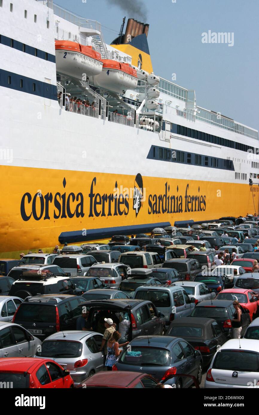 Cars queued to board ferry at Nice, South of France - 600dpi Stock Photo