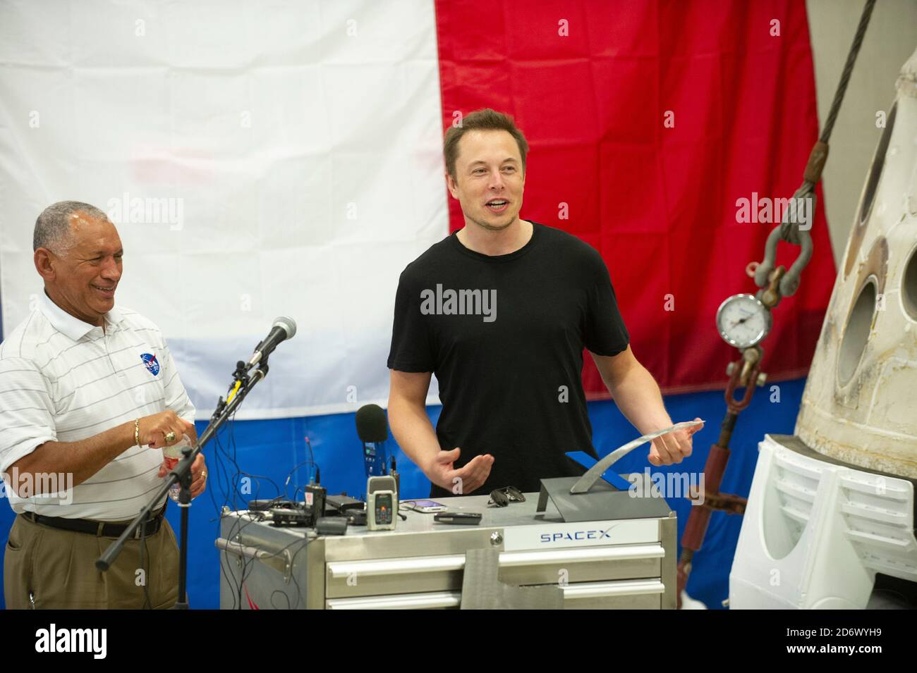 McGregor, Texas June 13, 2012: NASA chief administrator Charles Bolden, left, and SpaceX CEO and Chief Designer Elon Musk answer questions about the private Dragon spacecraft that returned to earth May 31st after delivering supplies to the International Space Station. Stock Photo