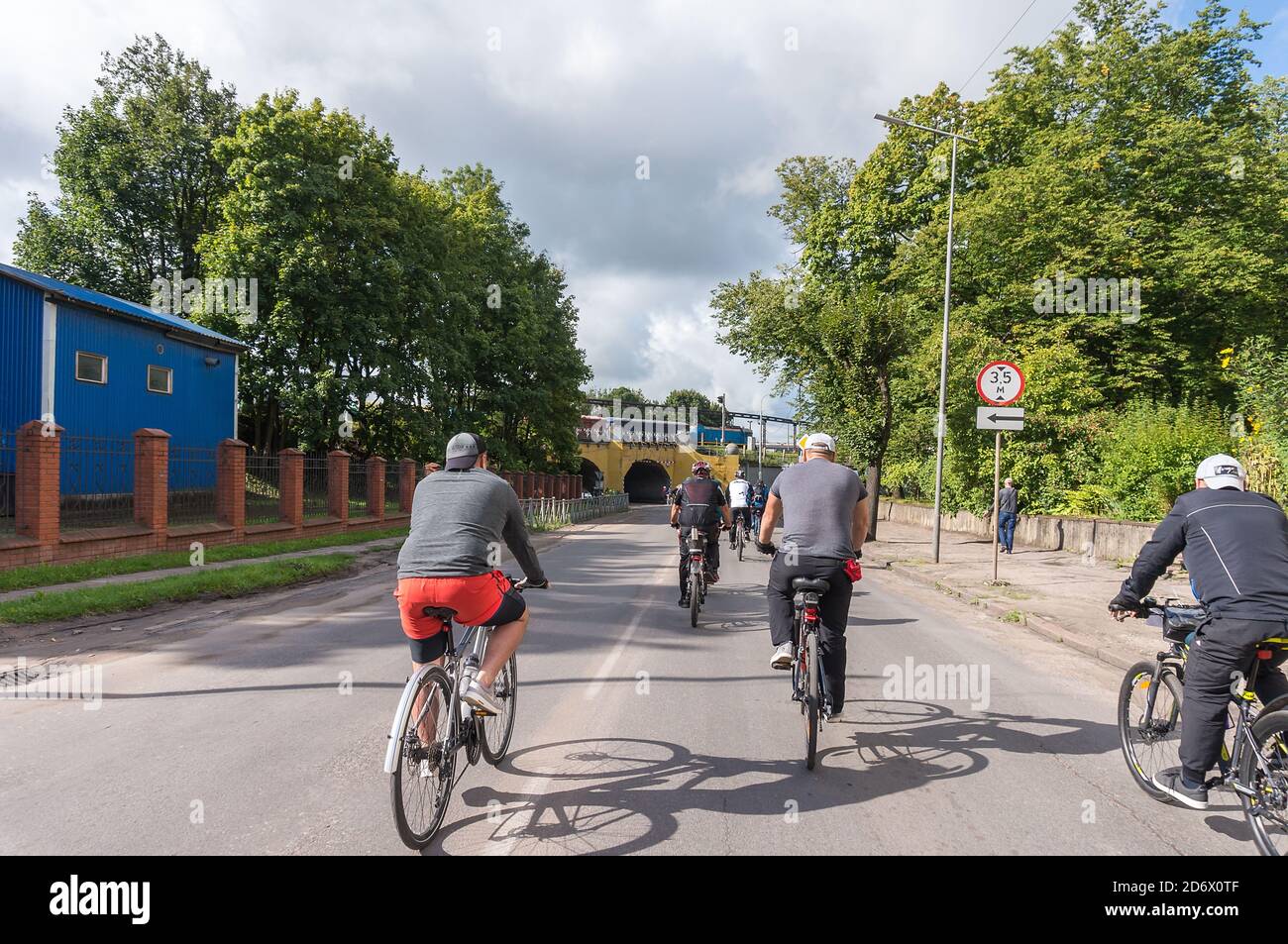 bike ride outside the city, cyclists ride on desert roads, Russia ...
