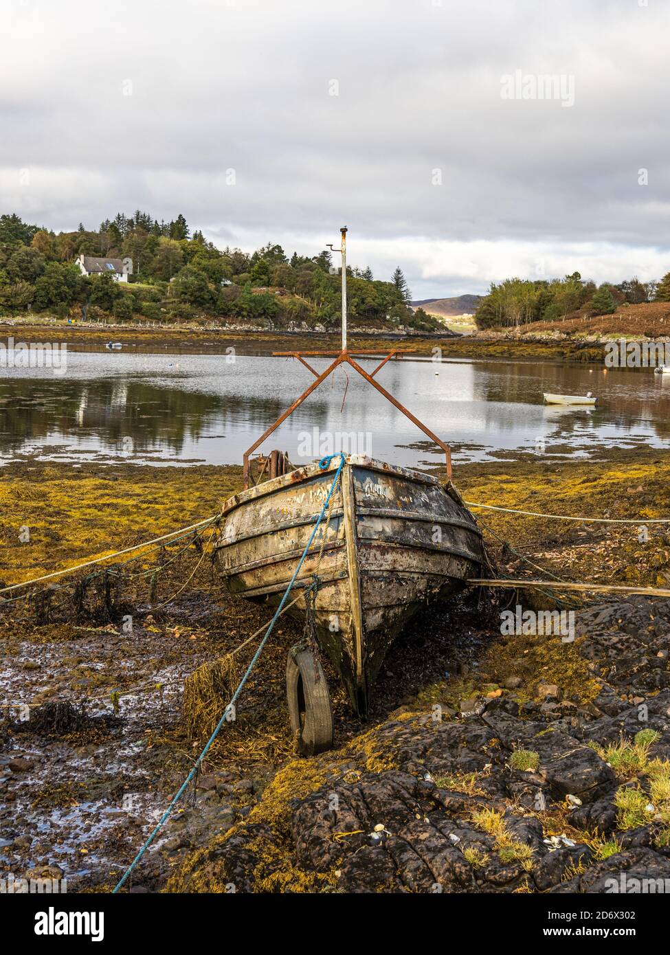 Boats abandoned on the shore at Badachro, Loch Gairloch, North West ...