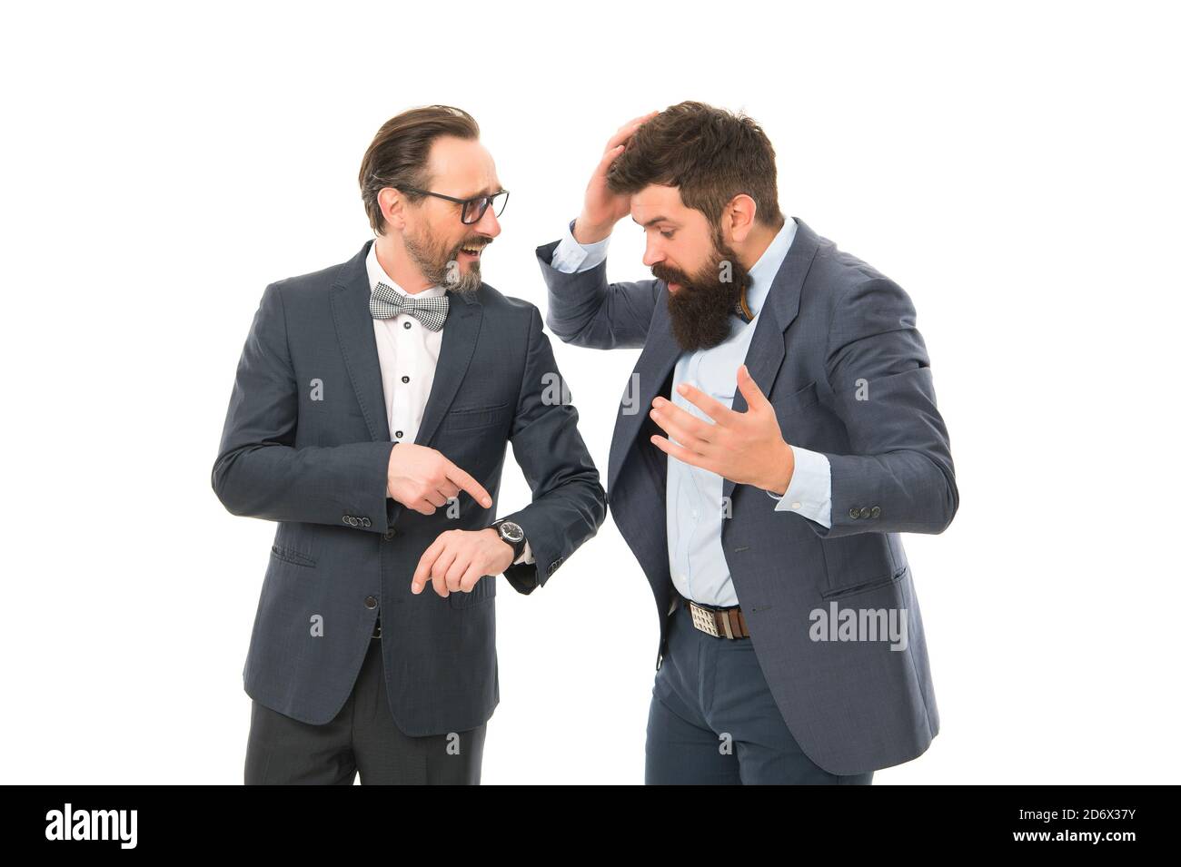 Business people formal clothes checking time. Time management discipline. Improve punctuality. Man mature boss with clock care about time efficiency. Coworkers discipline. Punctuality concept. Stock Photo