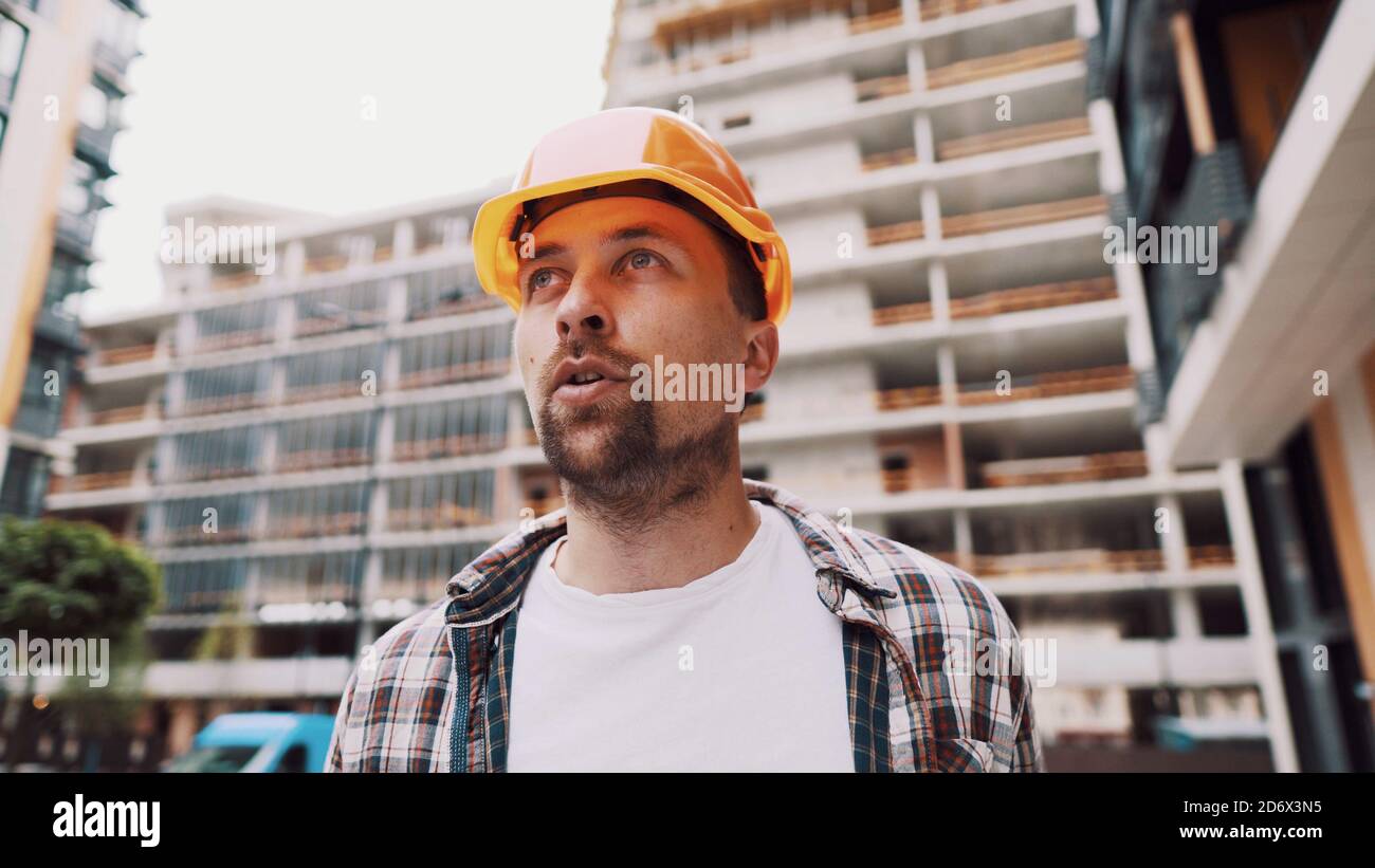 Angry construction foreman talking on hi-res stock photography and ...