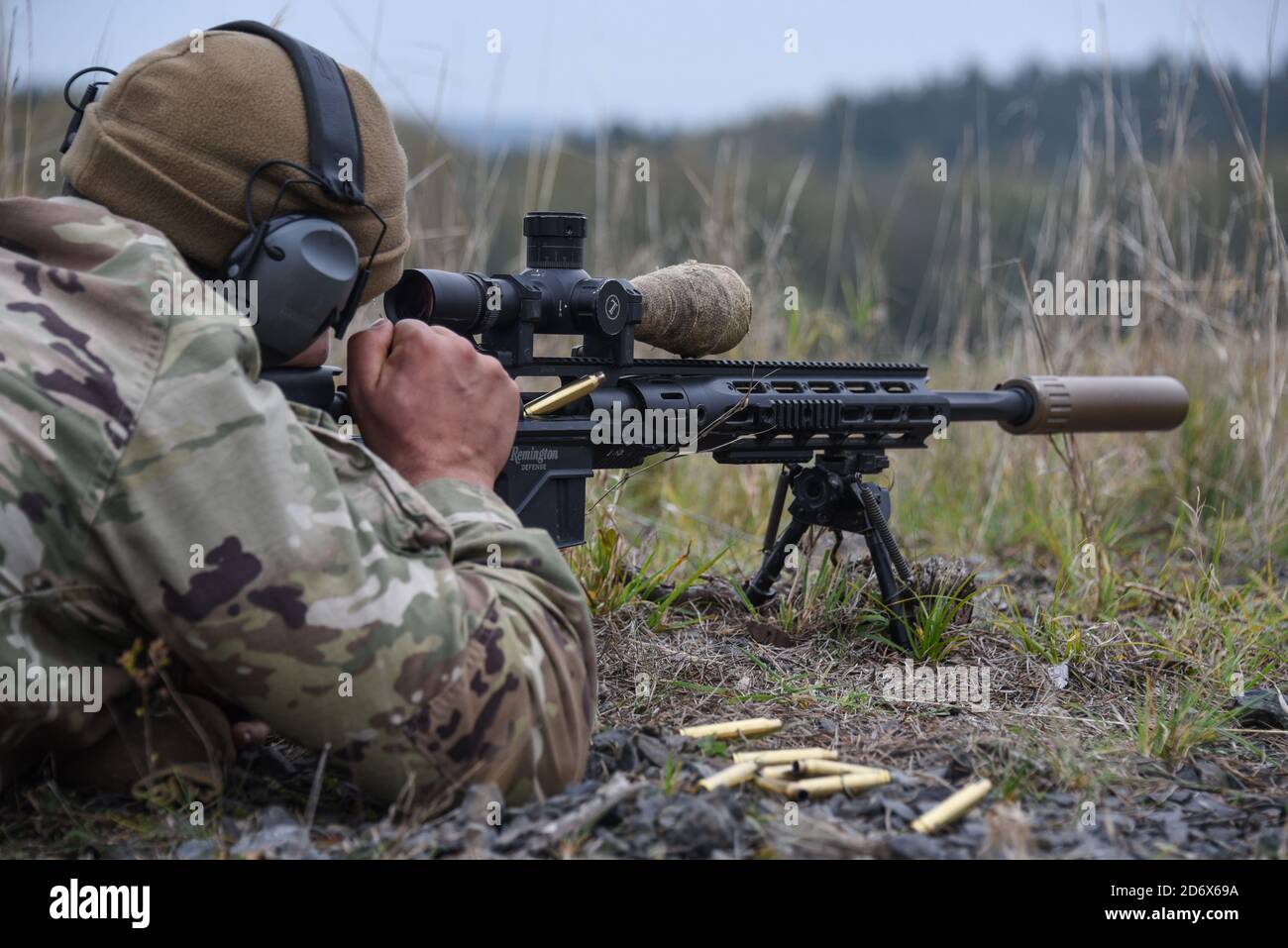 A U.S. Soldier, assigned to 3rd Infantry Division, zeros his sniper rifle during the Jäger Shot competition at the 7th Army Training Command's Grafenwoehr Training Area (GTA), Germany, Oct. 19, 2020. 7th ATC conducted the Jäger Shot competition from Oct. 18-23, 2020, to promote teambuilding, strengthen techniques, build esprit de corps and enhance mentorship within the sniper community. (U.S. Army photo by Markus Rauchenberger) Stock Photo