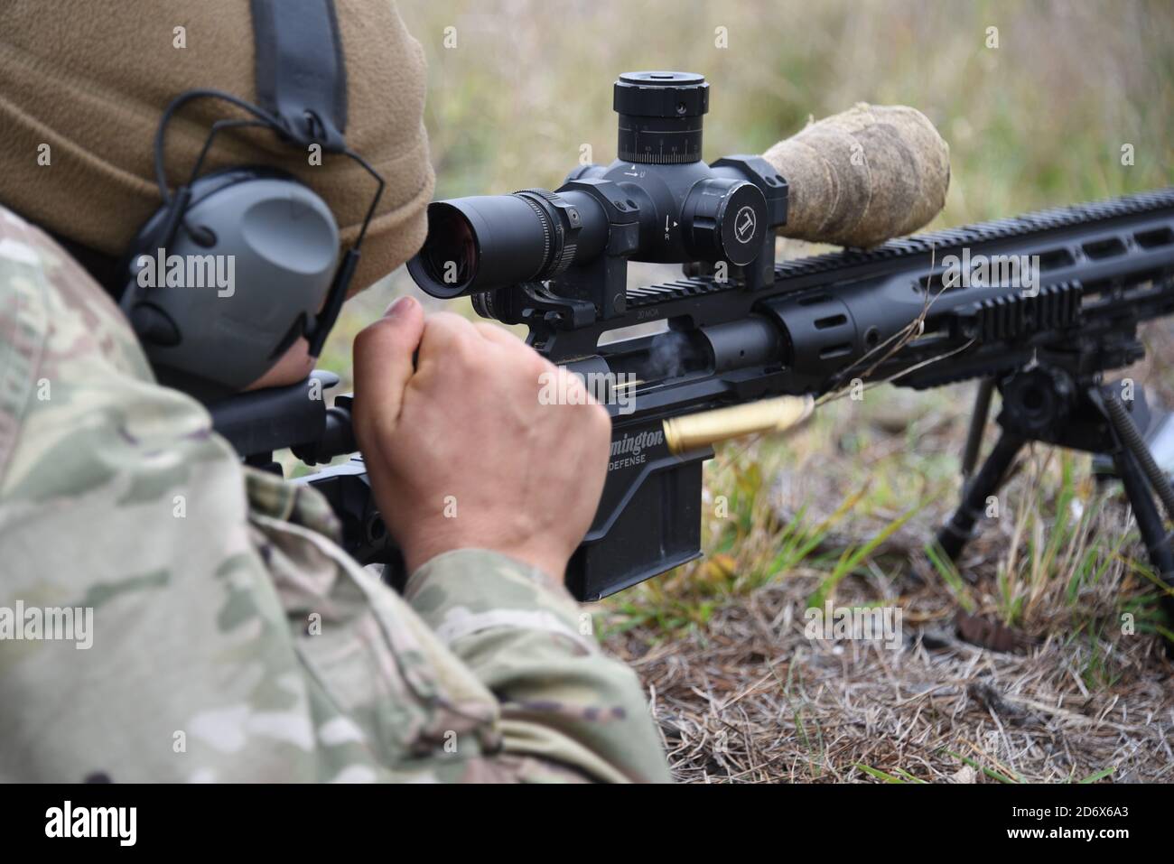 A U.S. Soldier, assigned to 3rd Infantry Division, zeros his sniper rifle during the Jäger Shot competition at the 7th Army Training Command's Grafenwoehr Training Area (GTA), Germany, Oct. 19, 2020. 7th ATC conducted the Jäger Shot competition from Oct. 18-23, 2020, to promote teambuilding, strengthen techniques, build esprit de corps and enhance mentorship within the sniper community. (U.S. Army photo by Markus Rauchenberger) Stock Photo