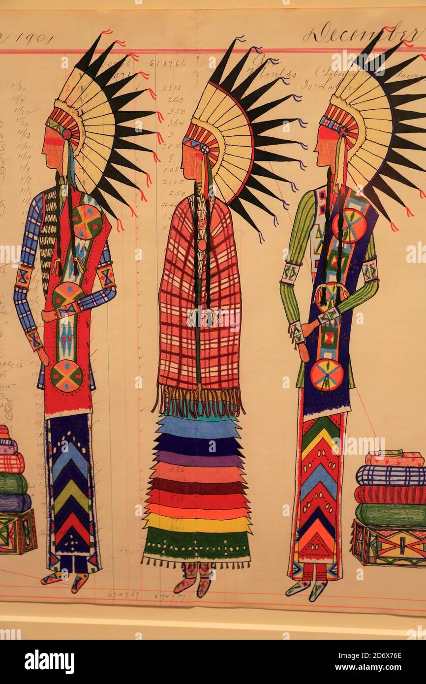 War Dance painted on antique ledger paper by Lauren Good Day Giago display in National