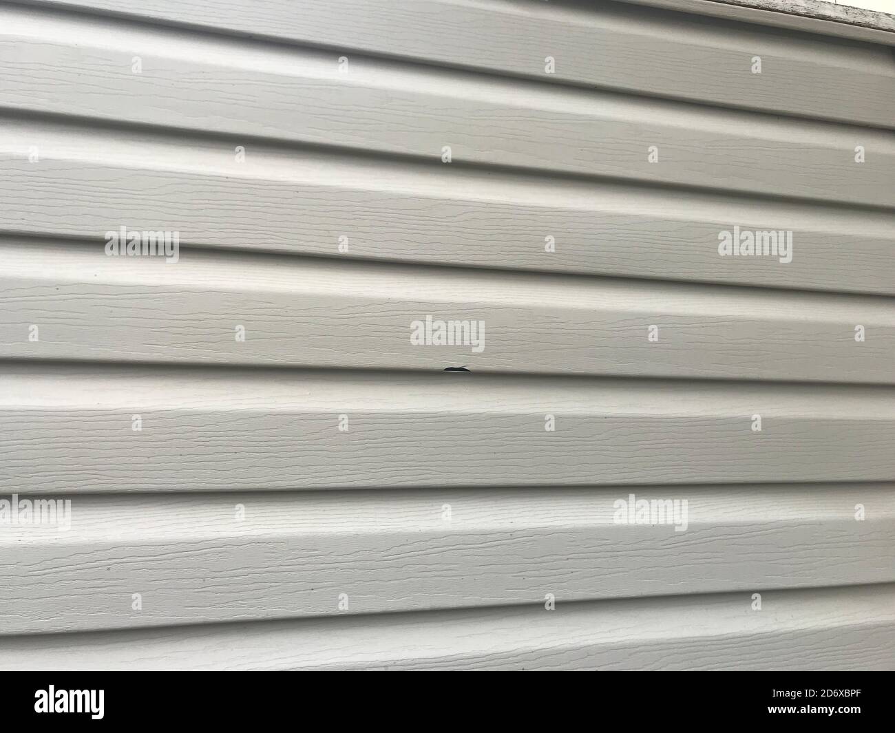 Exterior Vinyl Siding Damaged By Hail, Wind, Hailstorm Stock Photo Alamy