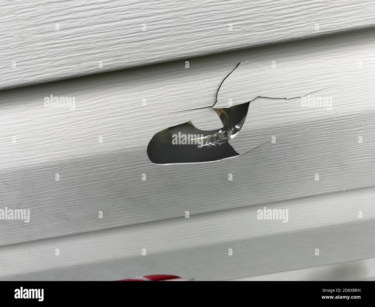 Exterior Vinyl Siding Damaged By Hail, Wind, Hailstorm Stock Photo Alamy